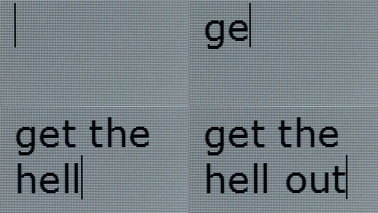 在屏幕上键入 “get the hell out”，近距离可见像素