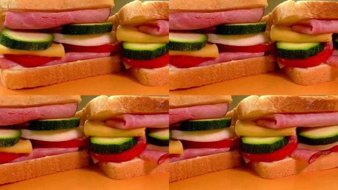 三明治配火腿、奶酪、蛋黄酱、番茄、萝卜、西葫芦