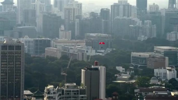 2015年8月1日，新加坡国庆阅兵彩排中的红狮跳伞表演
