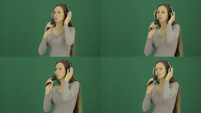 带麦克风的年轻可爱女孩，chromakey