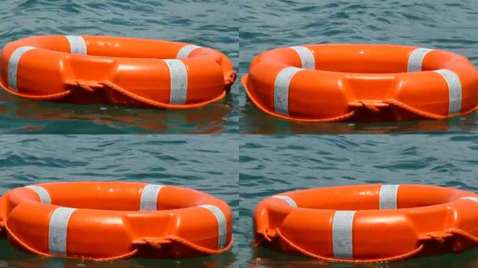 水面漂浮的红色救援浮标的特写镜头