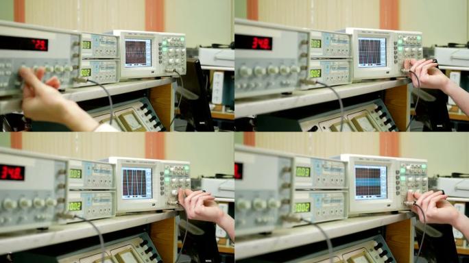 测量电信号的设备在物理实验室。记分牌点亮仪器数据。示波器和脉冲发生器一起工作