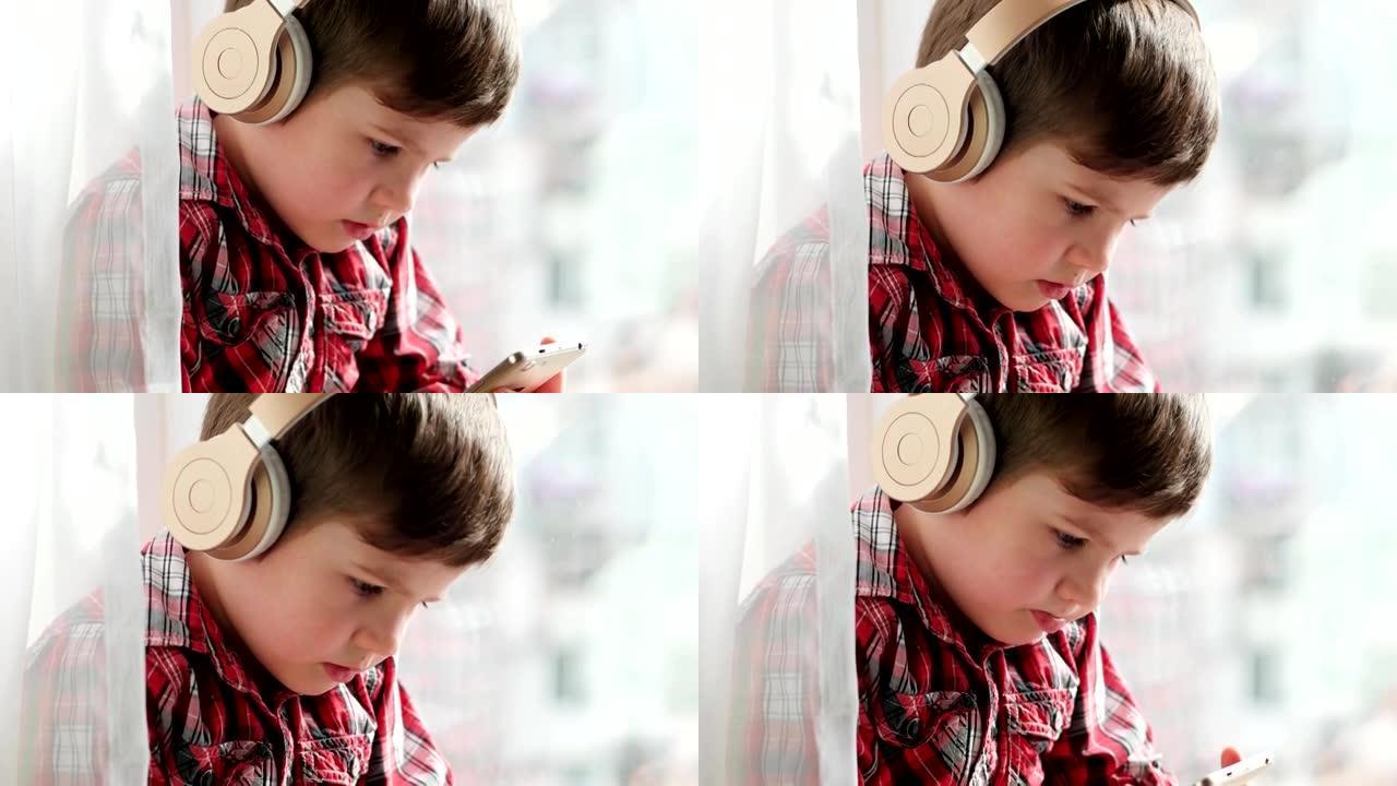 戴着智能手机耳机的男孩，特写肖像穿着衬衫看动画片的小孩