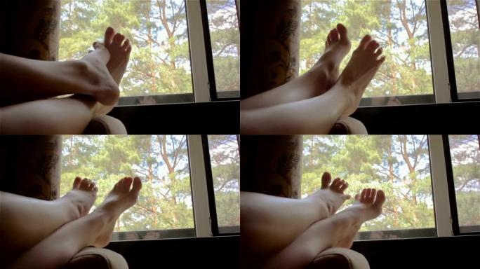 窗户背景上的美丽脚