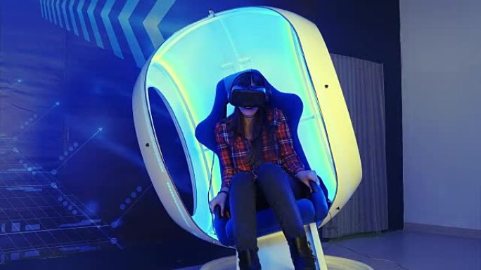 年轻女孩坐在虚拟现实的吸引力和感觉可怕