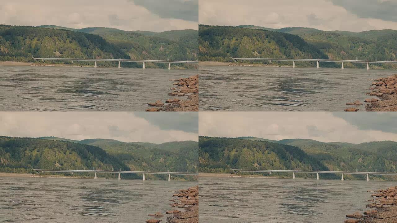 伟大的俄罗斯河流叶尼塞河。一座横跨大河的桥。