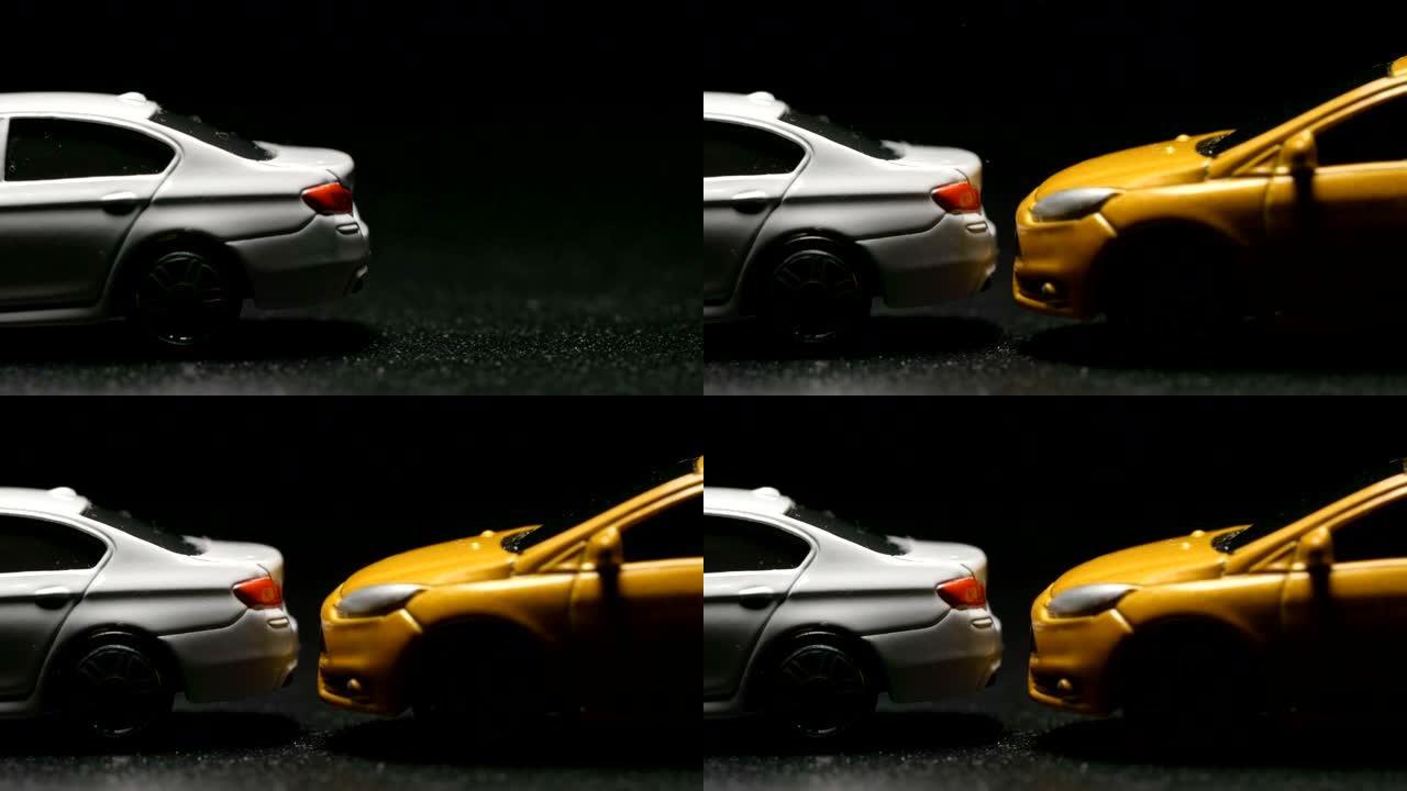 事故: 玩具模型车撞到白色玩具车的特写镜头 (慢动作)