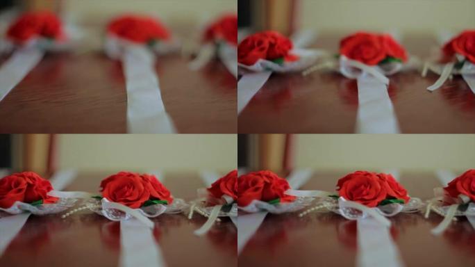 红玫瑰胸花为女性的手腕特写