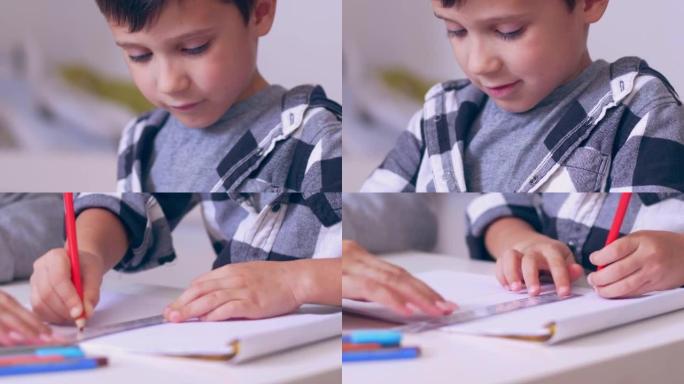 小男孩用标尺在字帖上画画