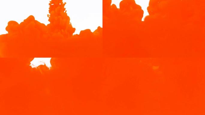 橙色丙烯酸涂料滴墨与水混合抽象背景