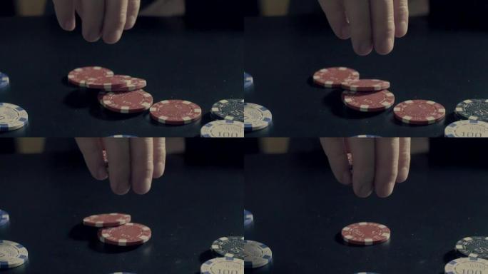 男人的手用扑克筹码展示技巧