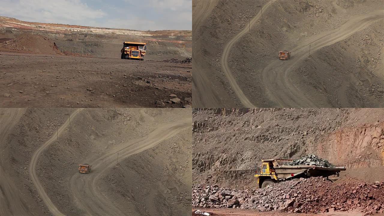 一辆大型自卸车经过职业生涯，一辆工业卡车在其采石场挖船，一辆大型黄色自卸车