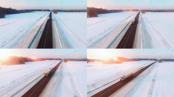 日落时，许多卡车在雪地公路上行驶