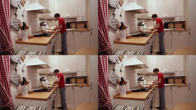 十几岁的男孩在厨房里做汉堡
