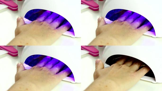修指甲-在指甲led灯中放置手和固化凝胶清漆