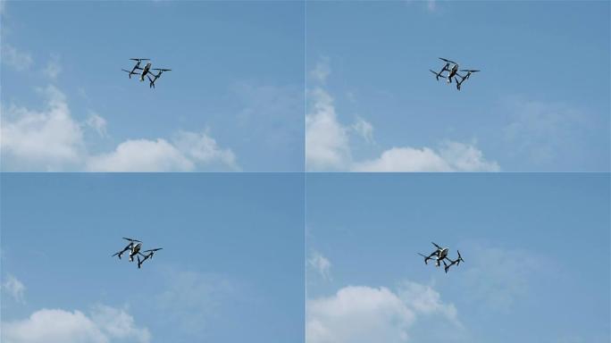 四旋翼飞行器在天空中飞行。摄像机上空中的现代保护区。
