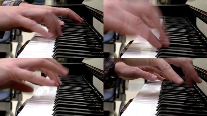 人的手在弹奏立式钢琴