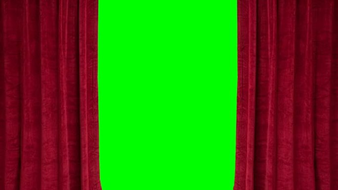 红色剧院窗帘打开以显示绿色屏幕