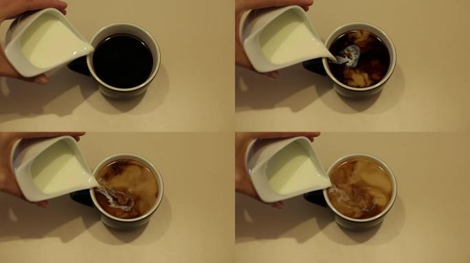 一杯热咖啡加牛奶在白色桌上慢动作