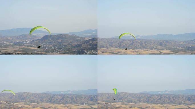 滑翔伞在山上练习滑翔伞运动