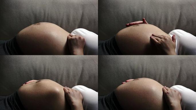 沙发上的胎动。胎动家具妊娠