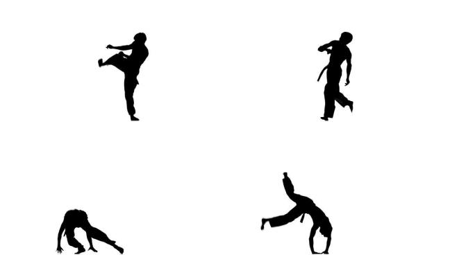 男子在白色背景上穿着黑色和服训练跆拳道或空手道，剪影