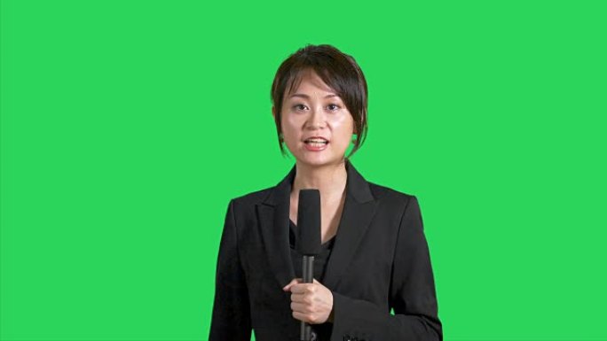绿屏上的中国新闻记者