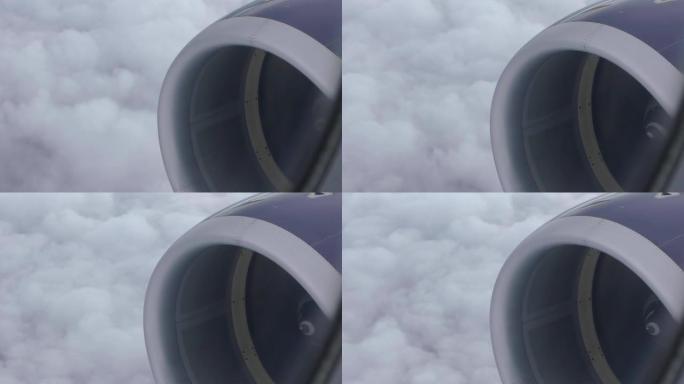 云层上方的飞机涡轮视图