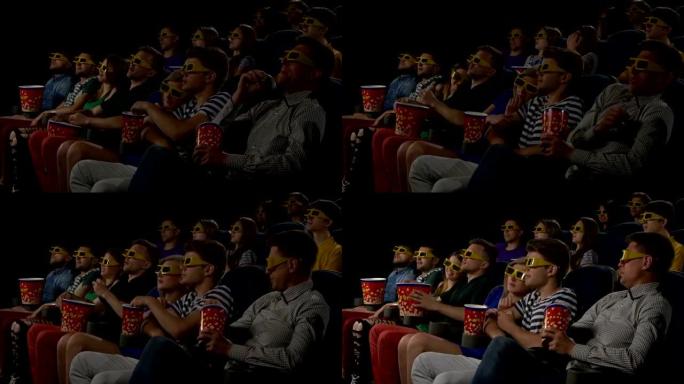 年轻人在电影院看电影: 3D恐怖