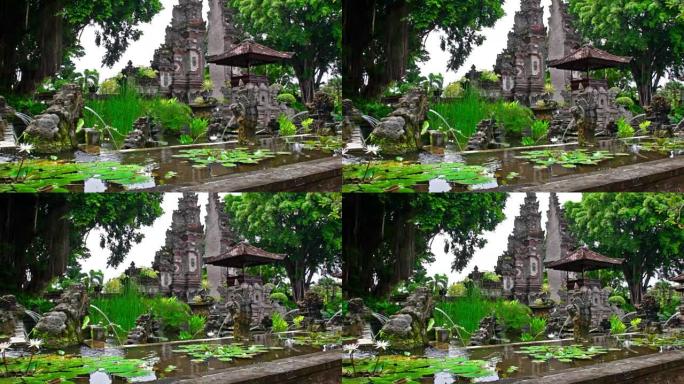 巴厘岛装饰有喷泉的人造池塘