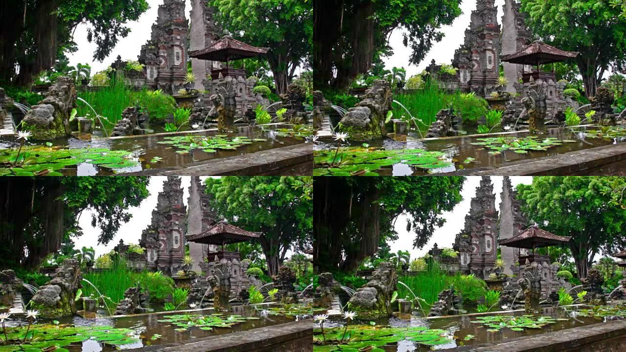 巴厘岛装饰有喷泉的人造池塘