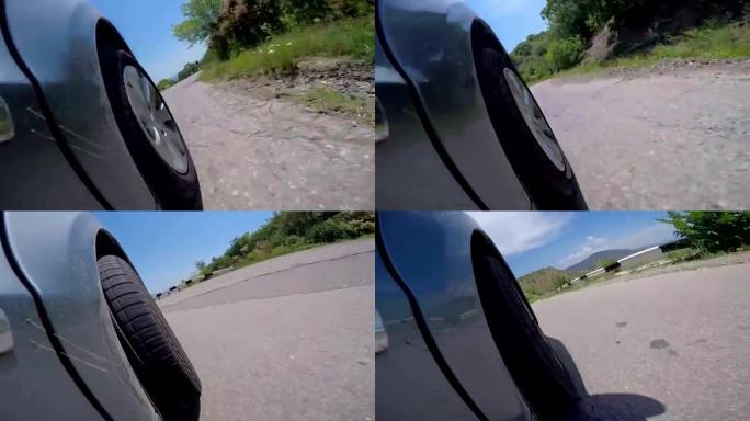 在阿鲁什塔和苏达克克里米亚之间的沿海公路上行驶的汽车的POV摄像机轮