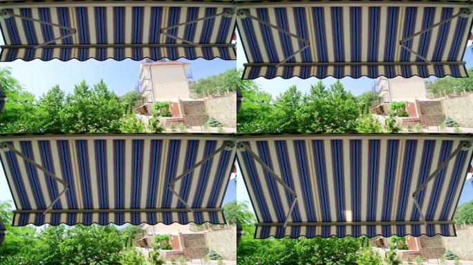 折叠式可伸缩遮阳篷开启过程