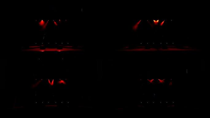 红色的舞台灯光，音乐会上的灯光表演。