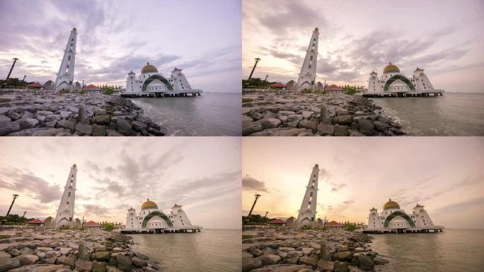 在马六甲海峡清真寺美丽的日出与移动和变化的彩云的延时4k镜头。