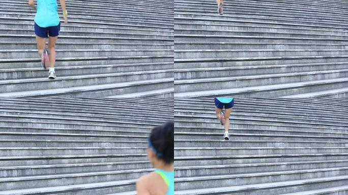 年轻的健身女跑步者在楼梯上奔跑