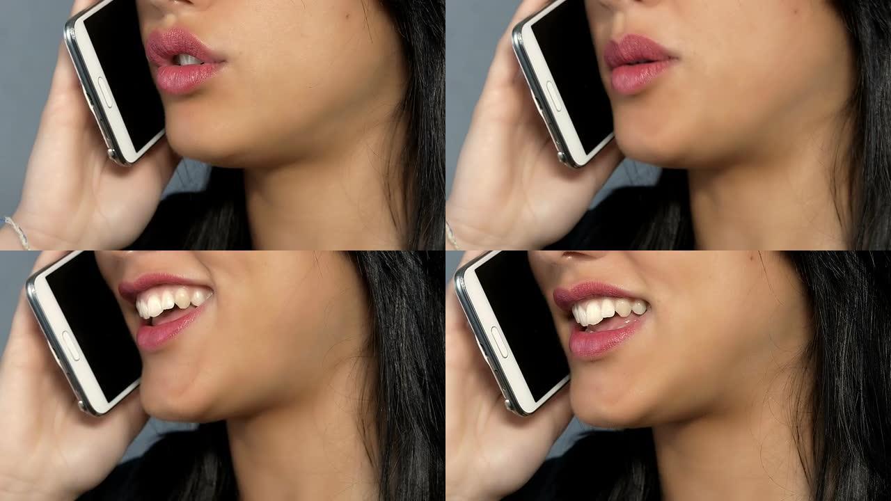 年轻女子接听手机: 女人在手机上聊天