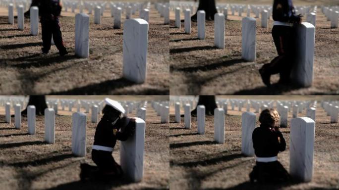 小士兵参观父亲的墓地