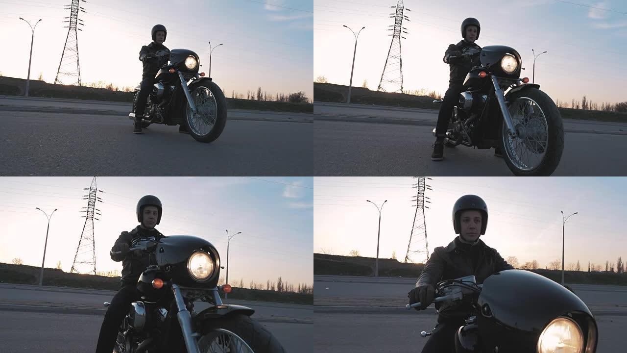 年轻人在日落时分坐在摩托车上慢动作