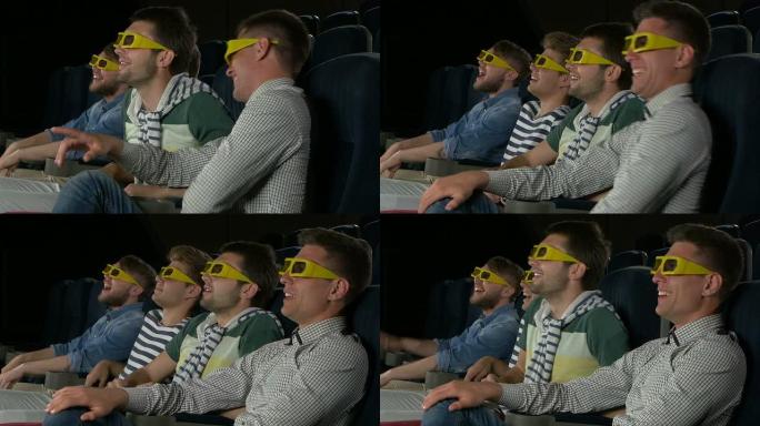 在电影院看电影的年轻朋友。特写，3D眼镜，侧视图