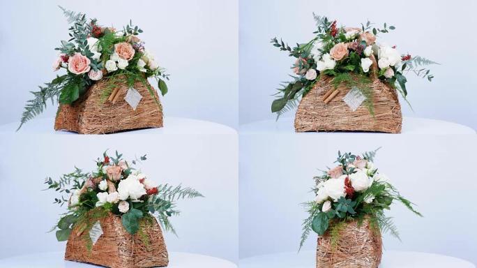 鲜花，花束，白色背景上的旋转，花卉组成由玫瑰卡布奇诺，雪花玫瑰，玫瑰亚娜奶油，Plamosus，桉树