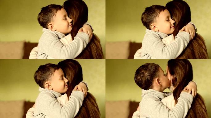 快乐的男孩温柔地拥抱了他的母亲
