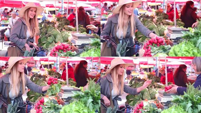 女孩在市场上摘萝卜
