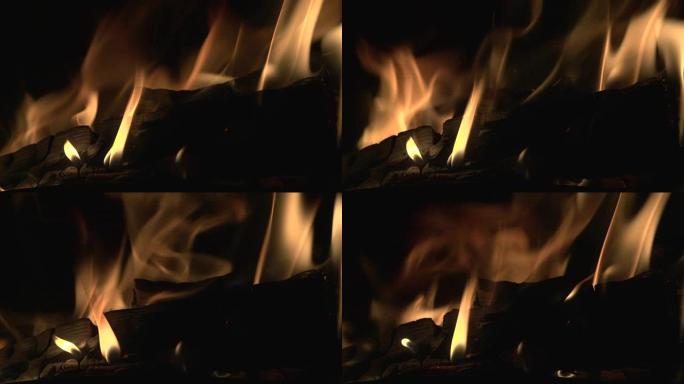 火焰缓慢且余烬上升的原木燃烧器