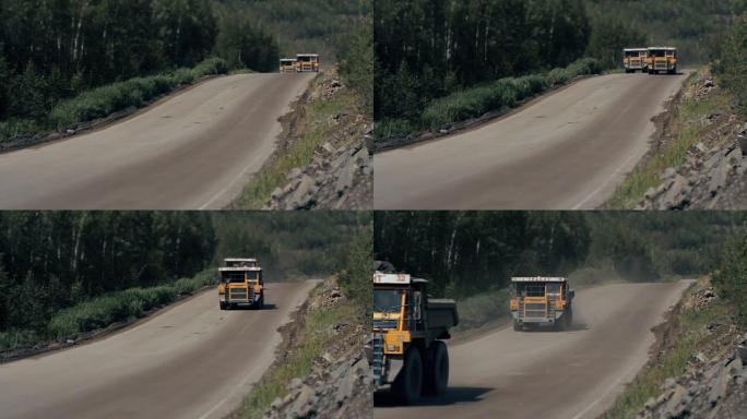 重型卡车将石材从采石场开采花岗岩倾斜移位