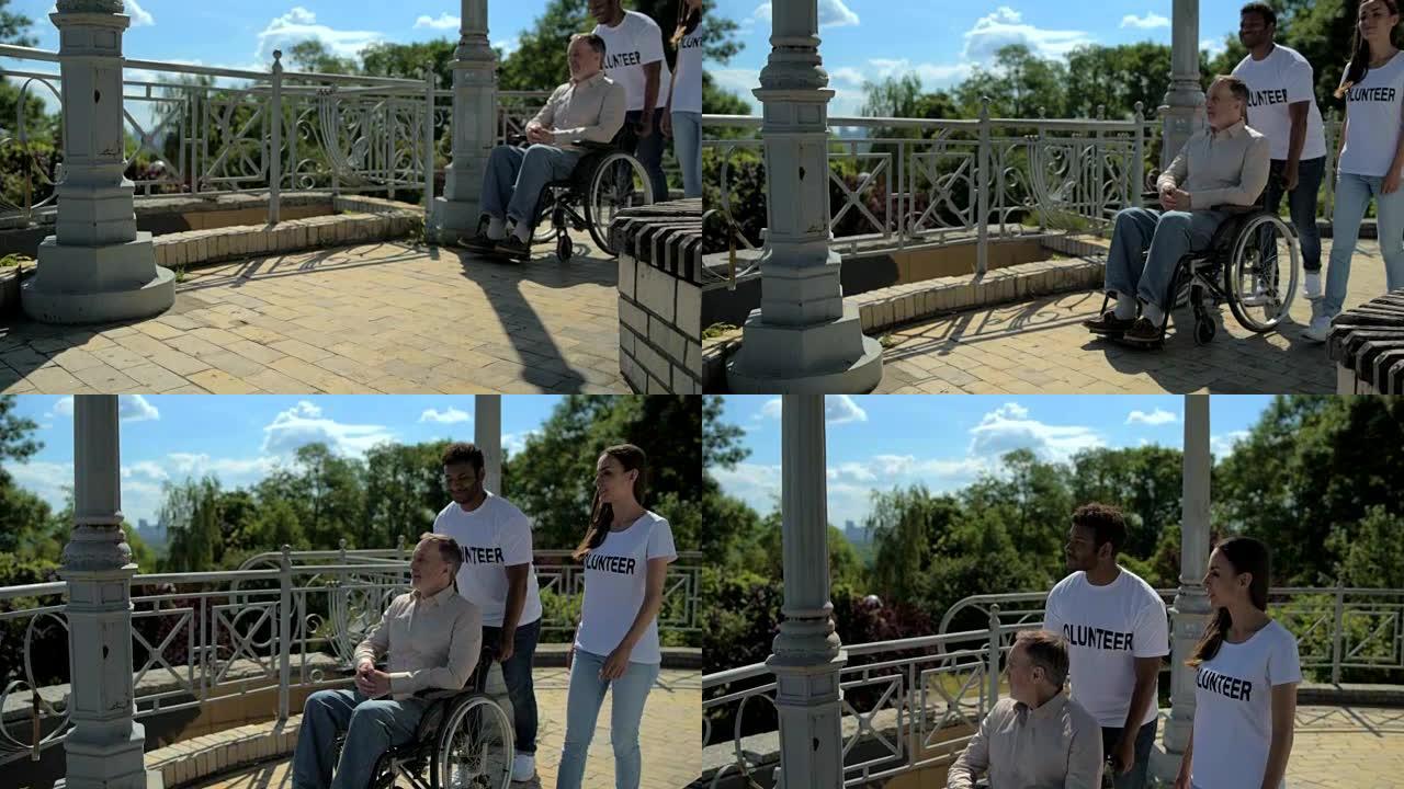 多莉拍摄了一名积极的志愿者与一名轮椅主持的退休男子散步