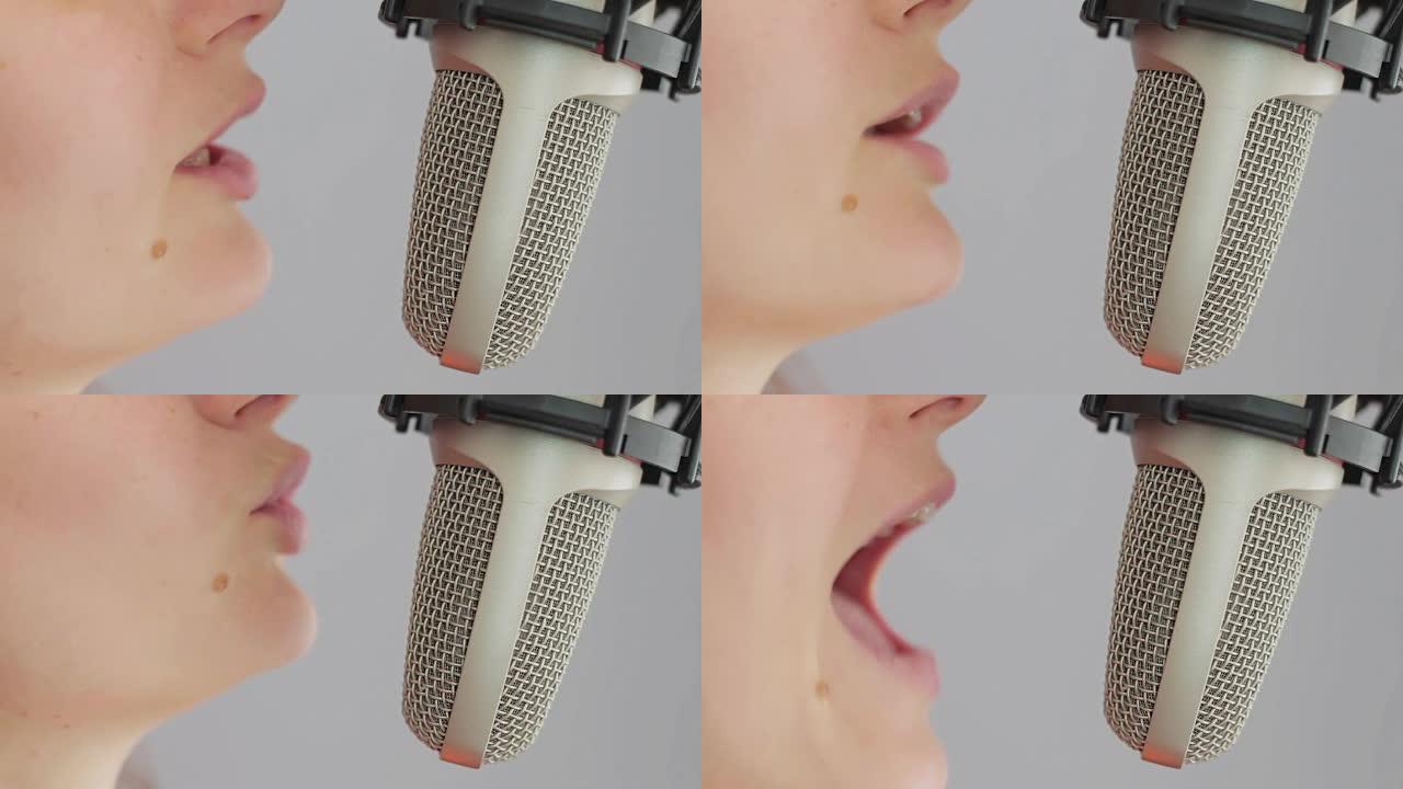 女孩在演播室麦克风中唱歌