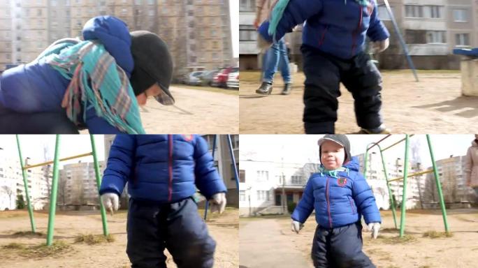 初春，一个有魅力的男孩和他的母亲在操场上散步了两年。穿着蓝色夹克和帽子