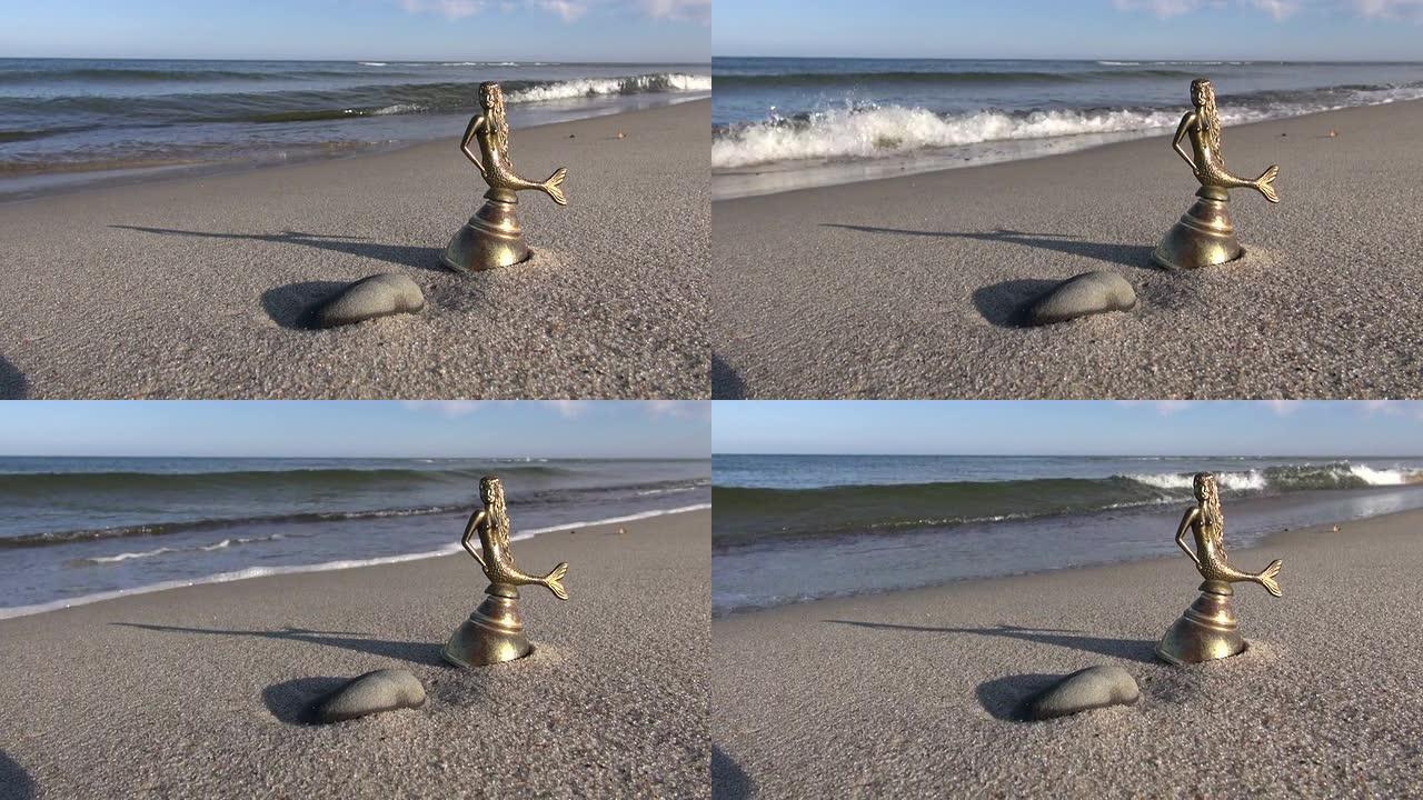 海滩上带有美人鱼形象的古董黄铜钟