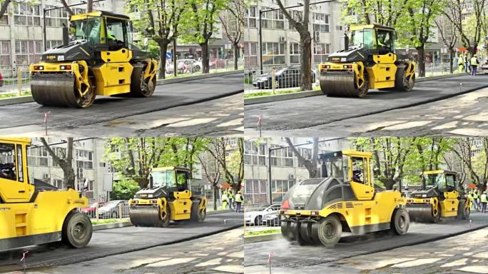 沥青摊铺机在修复后的城市道路上应用沥青。